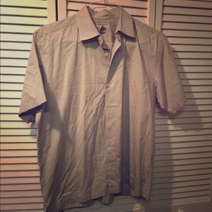 Tan button down short sleeved shirt